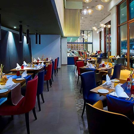 Grand Mercure Mysore - An Accor Brand Exterior foto The interior of the restaurant