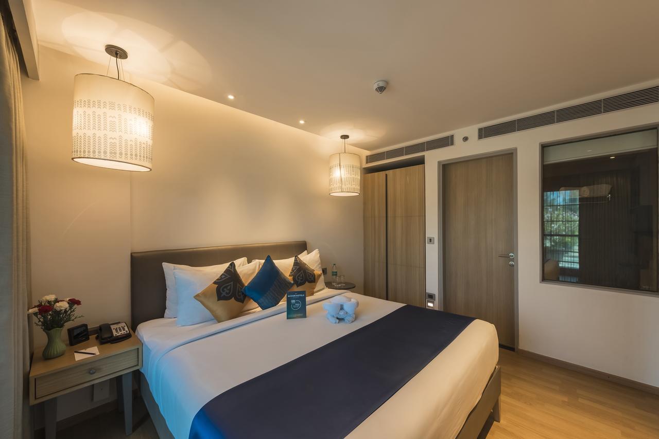 Grand Mercure Mysore - An Accor Brand Exterior foto A bedroom at the hotel